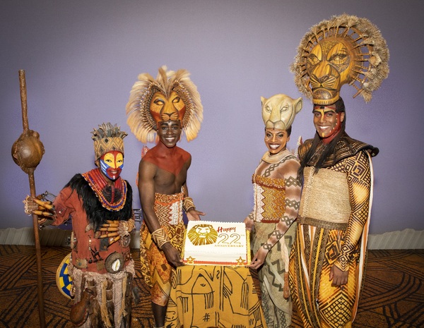 Nteliseng Nkhela as Rafiki, Bradley Gibson as Simba, Adrienne Walker as Nala and Michael Henry as Mufasa at 