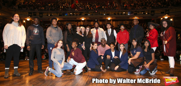 Deon'te Goodman with student performers Photo