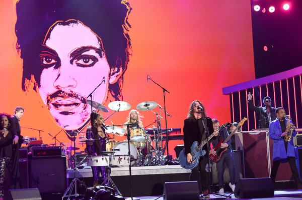 Sheila E. performs with Dave Grohl, Taylor Hawkins and Nate Mendel of Foo Fighters Photo