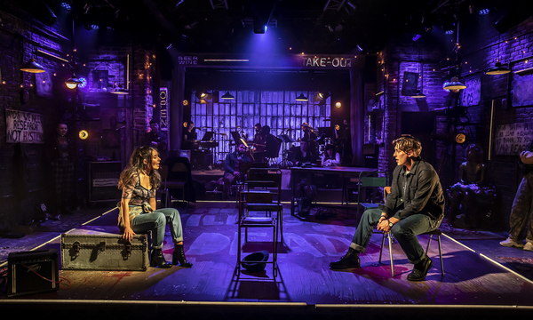 Maiya Quansah-Breed (Mimi) and Tom Francis (Roger) in RENT at Hope Mill Theatre. Phot Photo