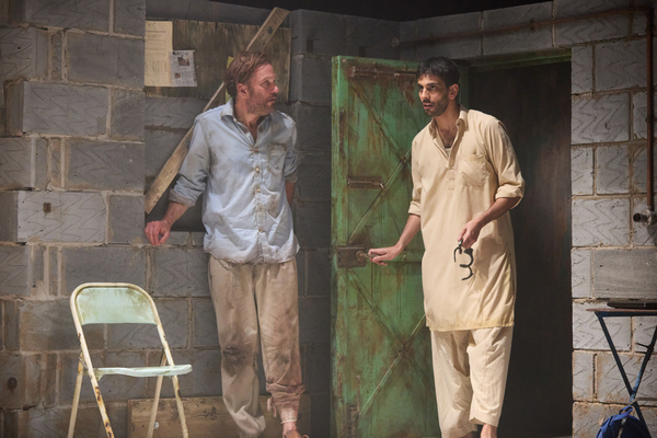 Photos: First Look at THE INVISIBLE HAND at the Kiln Theatre Image