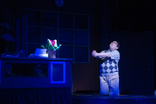 Seymour (Isaac Wesley Wilson) pleads with Audrey II to grow in the Arizona Broadway T Photo