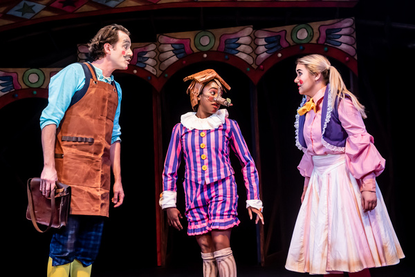 Anthony Spargo as Gepetto, Cassandra Hercules as Pinocchio and Alice De-Warrenne as A Photo