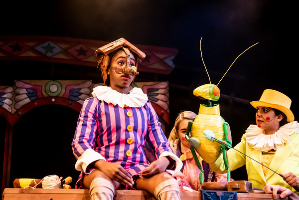 Cassandra Hercules as Pinocchio and Serin Ibrahim as Grillo in Pinocchio at Greenwich Photo