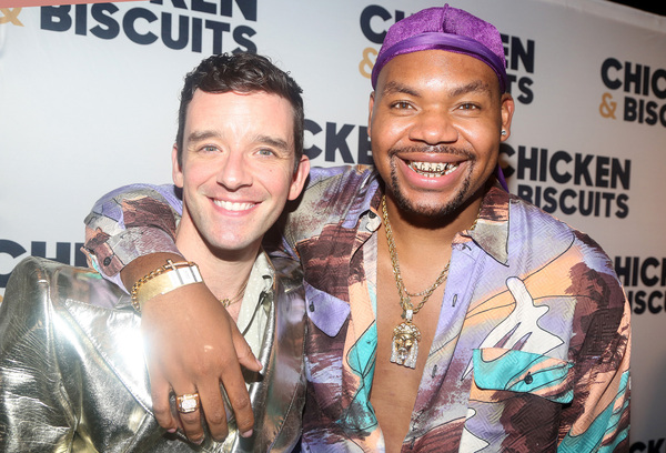 NEW YORK, NEW YORK - OCTOBER 10:  Michael Urie and Devere Rogers pose at the opening  Photo