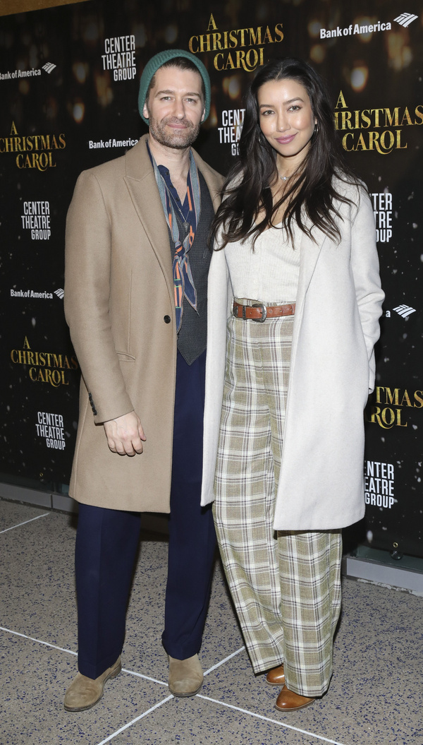 From left, Matthew Morrison and Renee Puente arrive for the opening night performance Photo