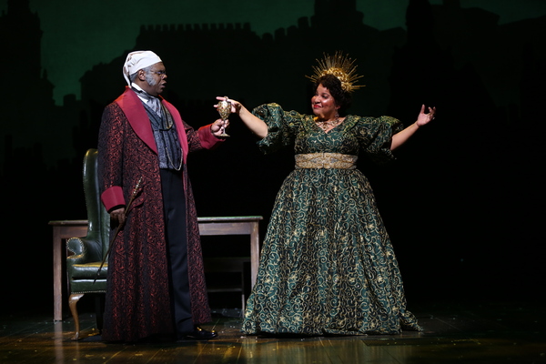 Craig Wallace as Ebenezer Scrooge and Rayanne Gonzales as Spirit of Christmas Present Photo