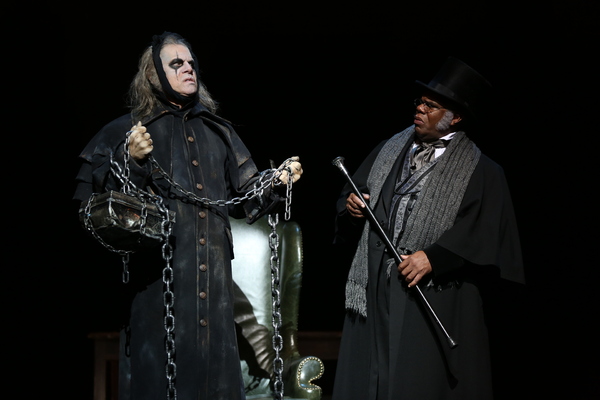 Stephen F. Schmidt as Marley’s Ghost and Craig Wallace as Ebenezer Scrooge Photo