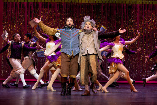 Justin Michael Wilcox, Randy Brenner (center), and the company of Something Rotten! Photo