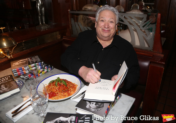 NEW YORK, NEW YORK - MARCH 01: Harvey Fierstein signs books at a dinner celebration f Photo