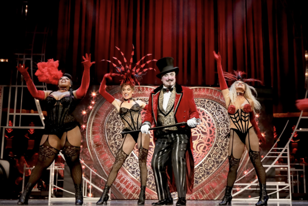 Clive Carter and the cast of Moulin Rouge! The Musical performing at the Olivier Awar Photo