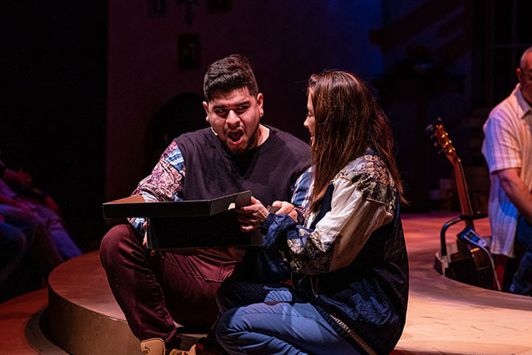 Brian Quijada (left) is the playwright and narrator and Gabriela Moscoso is Reina Photo