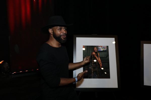 Unscripted Producer/Director Sekou Luke with his portrait of Ariana DeBose. Photo by  Photo