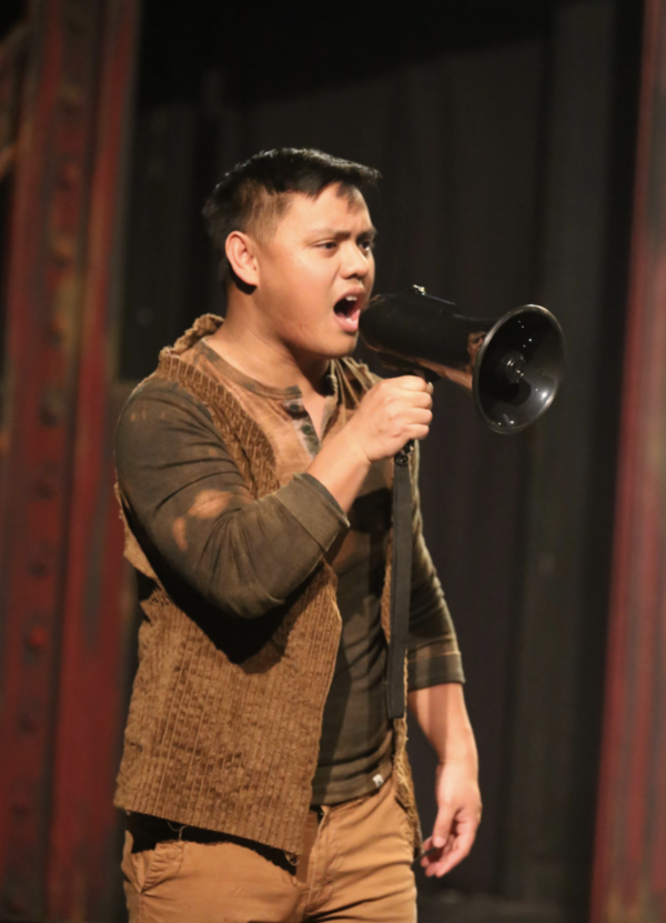 Bobby Strong (Kevin Corpuz) leads the rebellion in the Act I finale of New Line Theat Photo