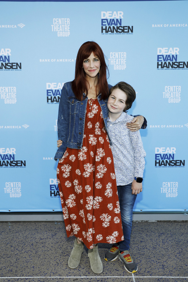 From left, actor Annie Wersching and her son Ozzie Wersching arrive for the opening n Photo