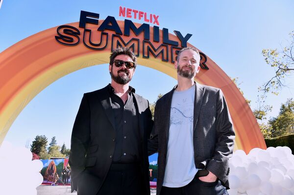 Director Chris Williams and star Karl Urban attend the Netflix premiere of the epic a Photo
