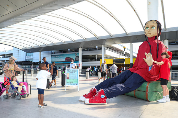 Photos: Five Metre-tall Puppet Aura Lands At Gatwick As Part Of Creative Crawley 