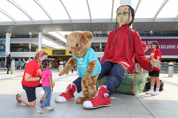 Photos: Five Metre-tall Puppet Aura Lands At Gatwick As Part Of Creative Crawley 