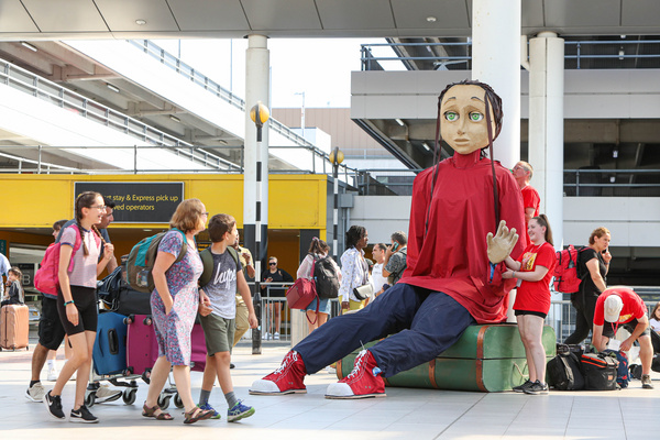 Photos: Five Metre-tall Puppet Aura Lands At Gatwick As Part Of Creative Crawley 