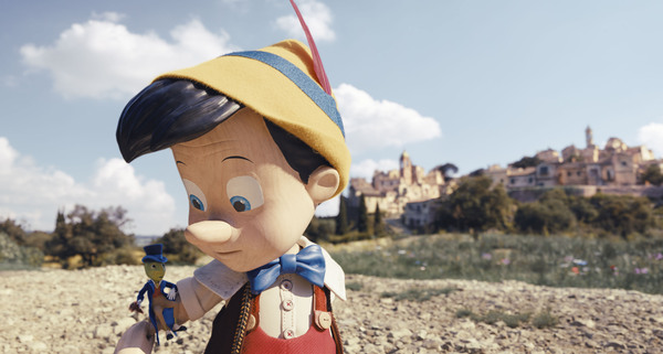 Jiminy Cricket (voiced by Joseph Gordon-Levitt) and Pinocchio (voiced by Benjamin Eva Photo