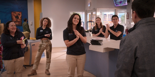 Olga Merediz as Connie, Kamaia Fairburn as Kayla, Melissa Fumero as Eliza, Madeleine Arthur as Hannah, Tyler Alvarez as Carlos, Randall Park as Timmy in episode 104 of Blockbuster