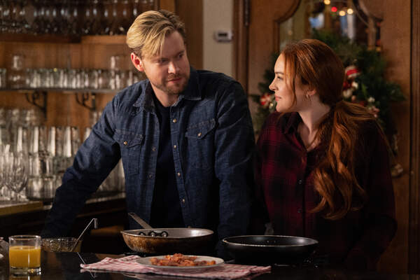 Photos: First Look at Lindsay Lohan & Chord Overstreet in FALLING FOR CHRISTMAS on Netflix Image
