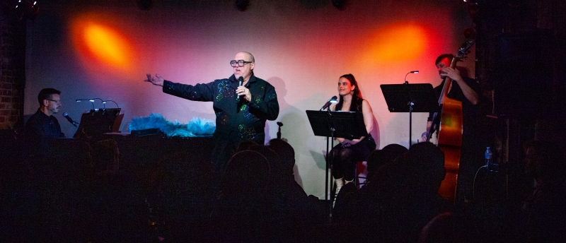Review: John Burns Makes 'Em Laugh at Don't Tell Mama With SOCK IT TO ME! Image