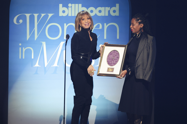 Sylvia Rhone accepts the Executive of the Year Award from Fatima Robinson onstage Photo