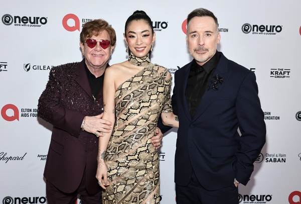 Elton John, Rina Sawayama and David Furnish Photo