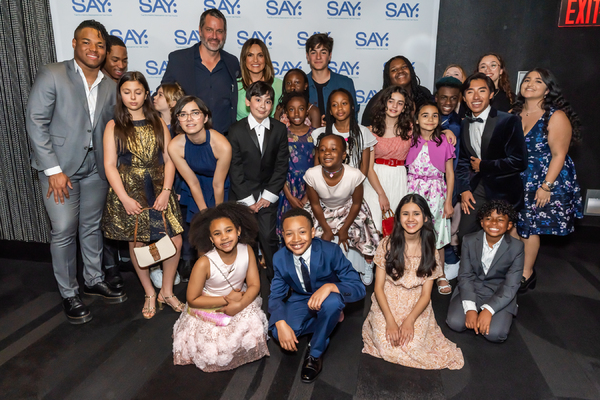 Peter Hermann, Mariska Hargitay and their family pose with the kids of SAY Photo