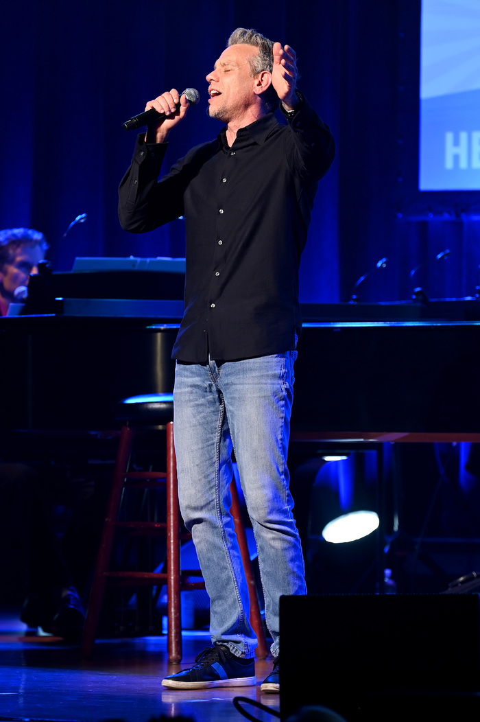 NEW YORK, NEW YORK - SEPTEMBER 18: Adam Pascal performs onstage during the 9th Annual Photo