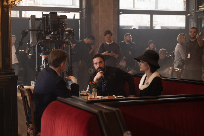 Caspar Phillipson as JFK, Director Pablo Larraín and Angelina Jolie as Maria Callas Photo