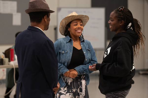 Ensemble member Jon Michael Hill, Brittany Bradford and director Awoye Timpo. Photo b Photo