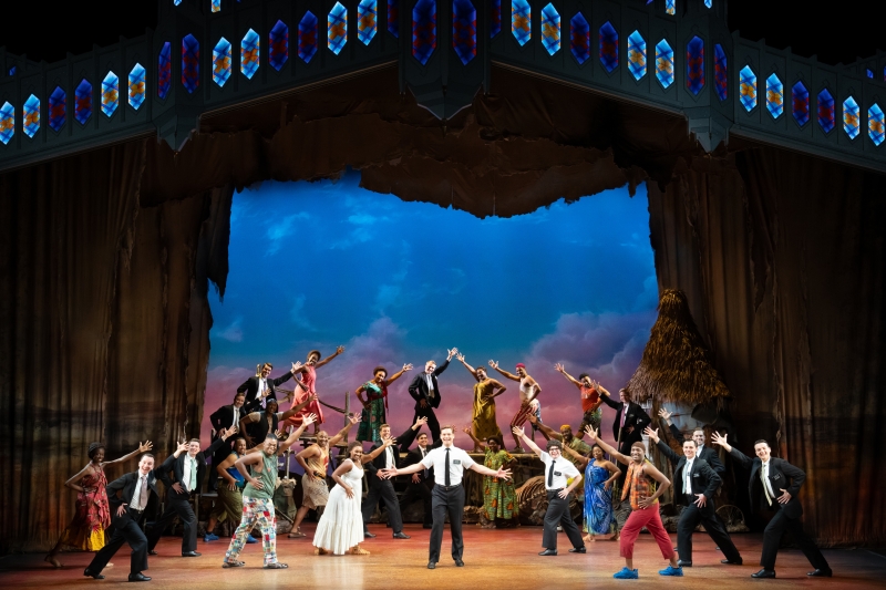 Review: THE BOOK OF MORMON Triumphs with Bright Songs and Chaotic Energy  Image