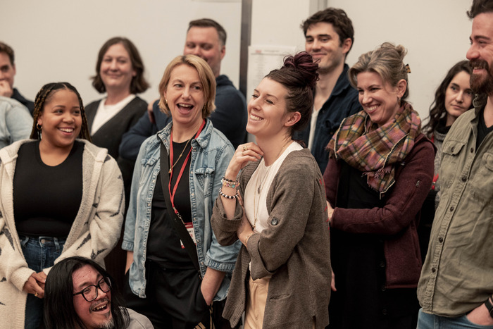 Playwright Kate Trefry (center) with the company  Photo