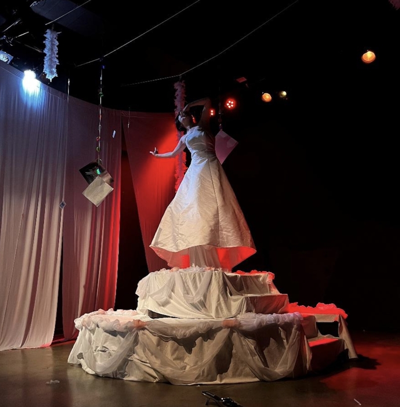 Are You the Last Slice? Unveiling the Layers of Set Design in Yafei Hu's Latest Production Image