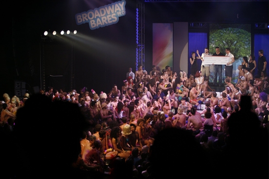 Cheyenne Jackson and Christopher Seiber and cheering crowd Photo