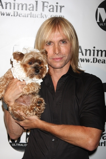 Marc Bouwer (Designer) with his dog Goliath Photo