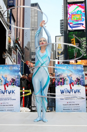 Wintuk star Elena Lev works some hula magic in Times Square Photo