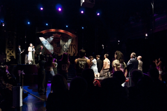 Jan Buttram, Abingdon Theatre Company Artistic Director, at microphone with the cast
 Photo