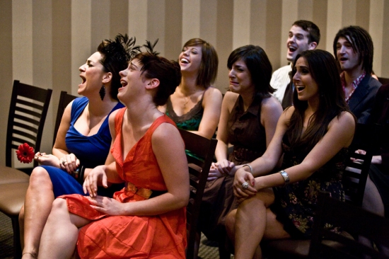 Shoshana Bean and cast can't help but laugh at the events before them... Photo