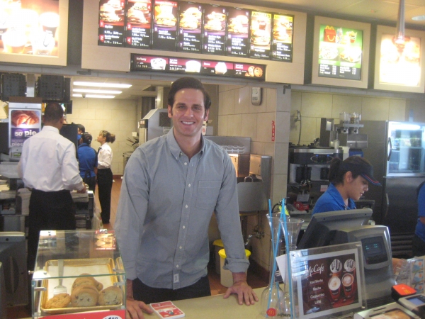 Andrew Ragone working the register Photo