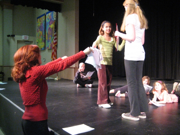Andrea McArdle working on the Miss Hannigan/Annie scene with students Photo