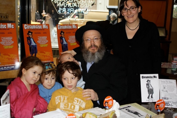 Yisrael Campbell, his wife Avital and their family celebrate the sandwich naming at B Photo