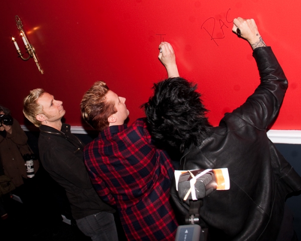 Mike Dirnt, Tre Cool and Billie Joe Armstrong Sign the ST. James Wall Photo