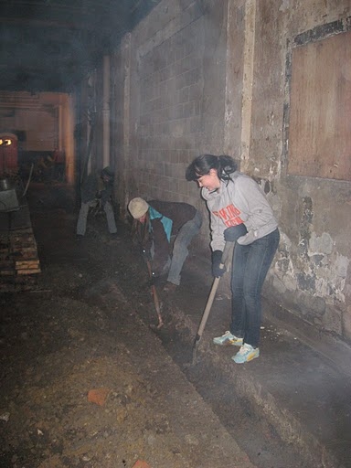 Tay Lane, Erin Prosser dig a trench for underground pipes Photo