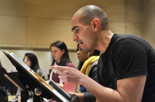 Foreground: Javier Munoz. Background: Angela Wildflower Polk, Anna Eilinsfeld and And Photo