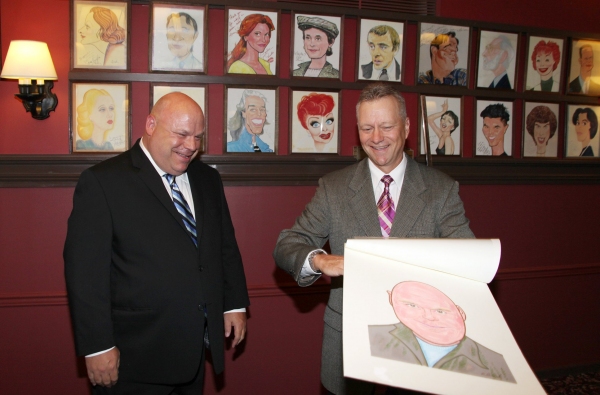 Max Klimavicius presents Kevin Chamberlin with his new caricature! Photo