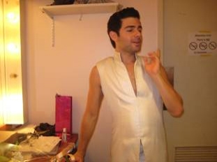 Adam Kantor warming up his pipes before the show.  Photo