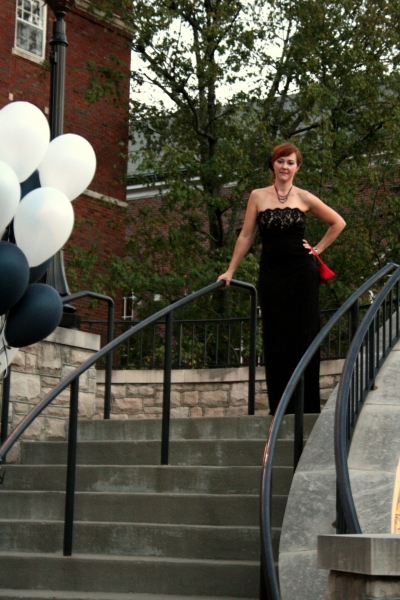 Corrie Miller strikes a pose on the staircase. Photo